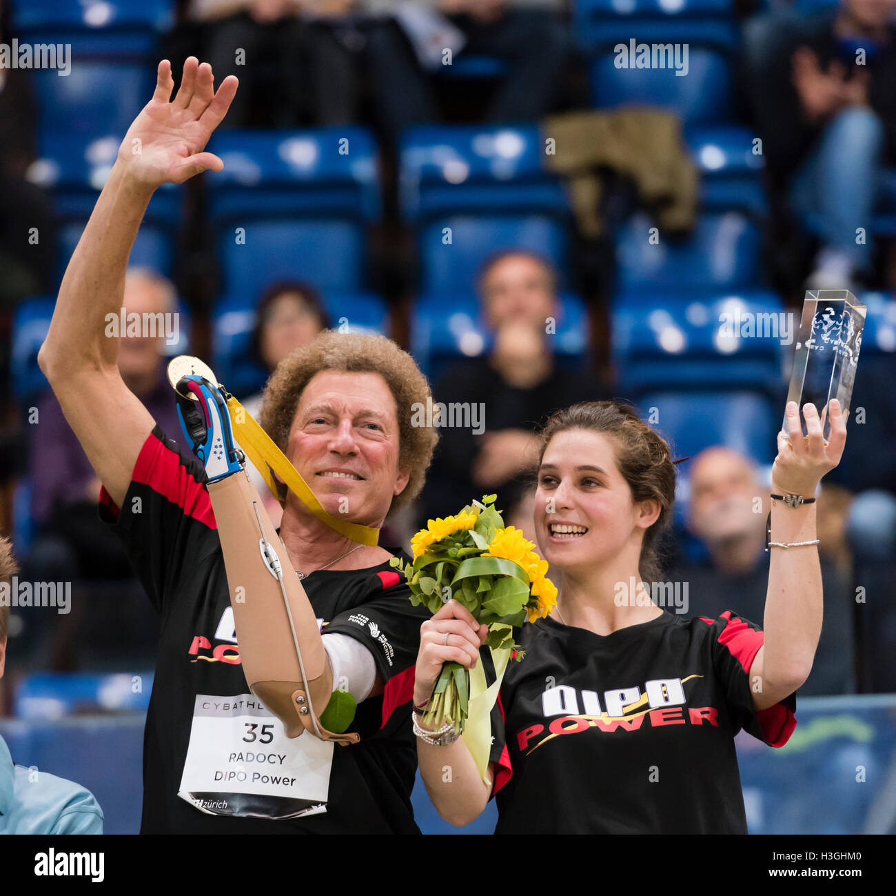Kloten, Switzerland - 8 October 2016: Bob Radocy (USA, left) and his able-bodied teammate Monica Moreo from DIPO Power (TU Delft, NED) celebrate winning the powered arm prosthetics race at Cybathlon, the first championship for racing pilots with disabilities using bionic devices at the Swiss Arena in Kloten (Zurich), Switzerland. Credit:  Erik Tham/Alamy Live News Stock Photo