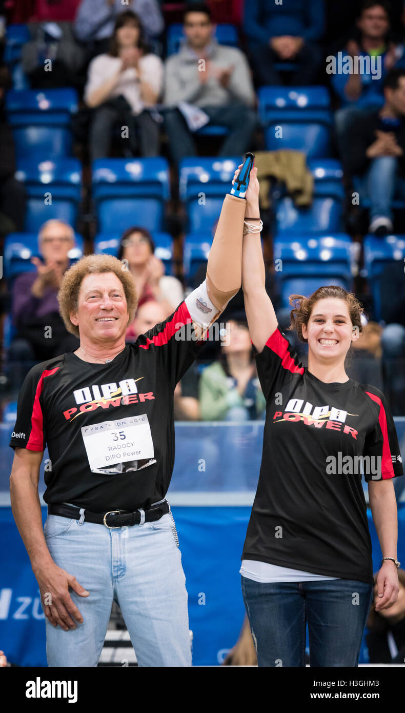 Kloten, Switzerland - 8 October 2016: Bob Radocy (USA, left) and his able-bodied teammate Monica Moreo from DIPO Power (TU Delft, NED) celebrate winning the powered arm prosthetics race at Cybathlon, the first championship for racing pilots with disabilities using bionic devices at the Swiss Arena in Kloten (Zurich), Switzerland. Credit:  Erik Tham/Alamy Live News Stock Photo