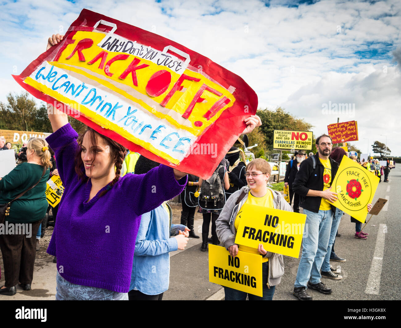 Preston, Lancashire, UK. 8th October, 2016. Local resident Hannah Smalley joins anti-fracking protestors gathering for a rally to express concern over plans to frack land on Preston New Road despite local authorities rejecting the proposal. Credit:  Jason Smalley Photography/Alamy Live News Stock Photo