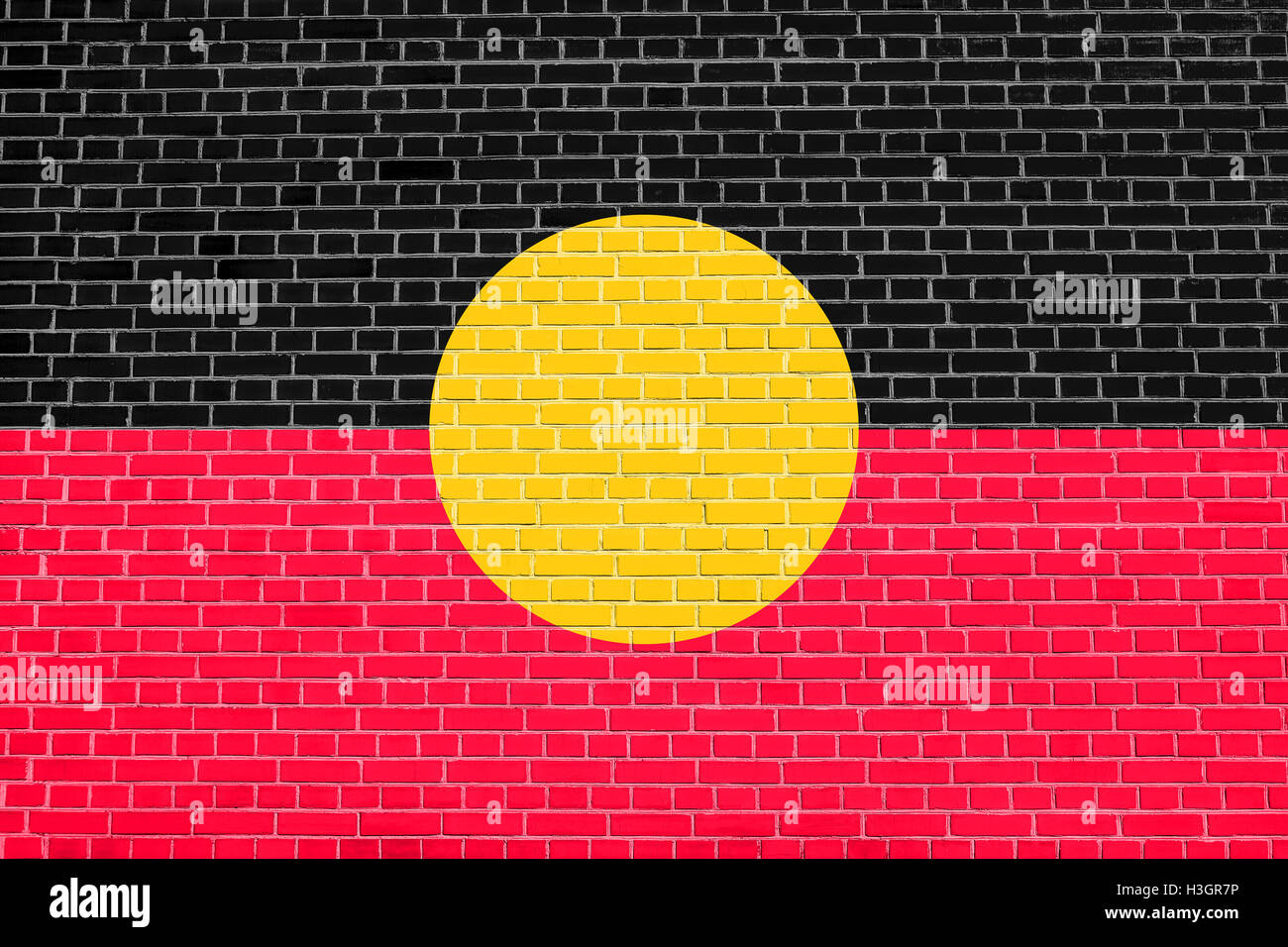 Australian Aboriginal official flag. Commonwealth of Australia patriotic symbol, banner, element, background. Stock Photo