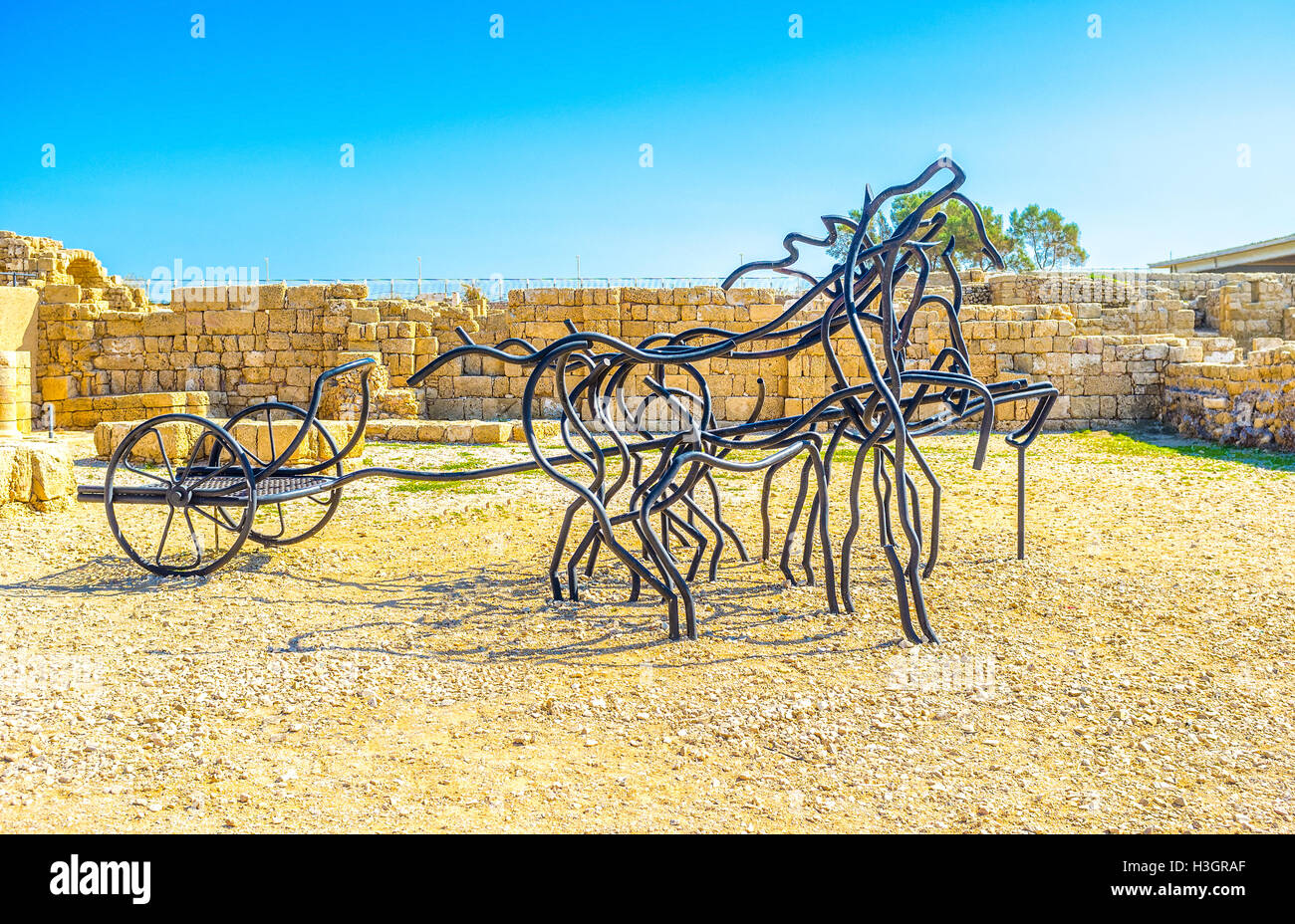 The modern sculpture depicts two-wheeled horses-drawn chariot, popular in Roman times. Stock Photo