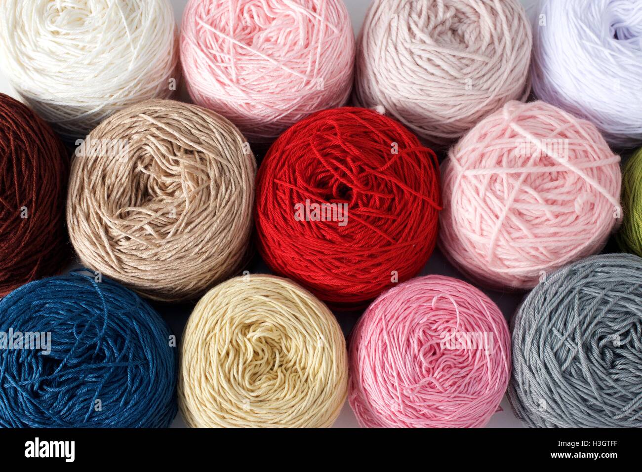 Balls of wool cotton silk yarn set top view Stock Photo Alamy