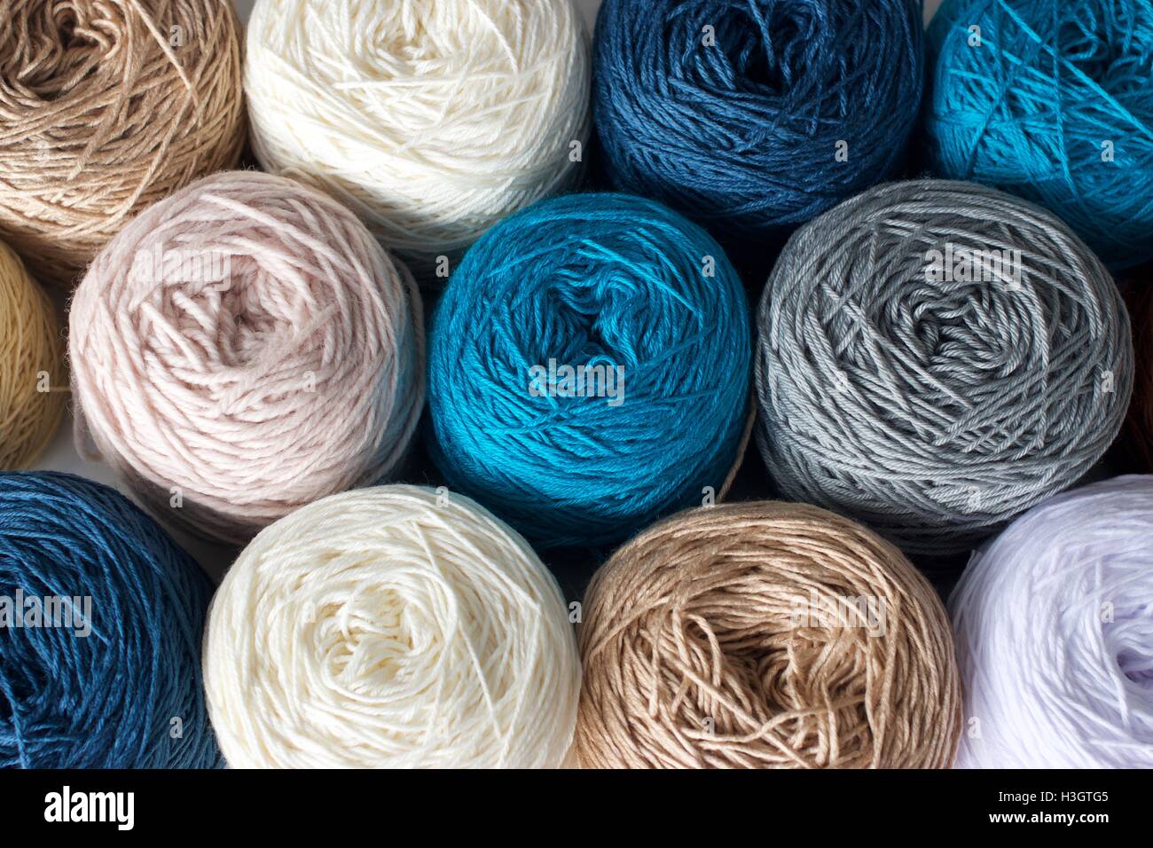 Balls of wool cotton silk yarn set top view Stock Photo