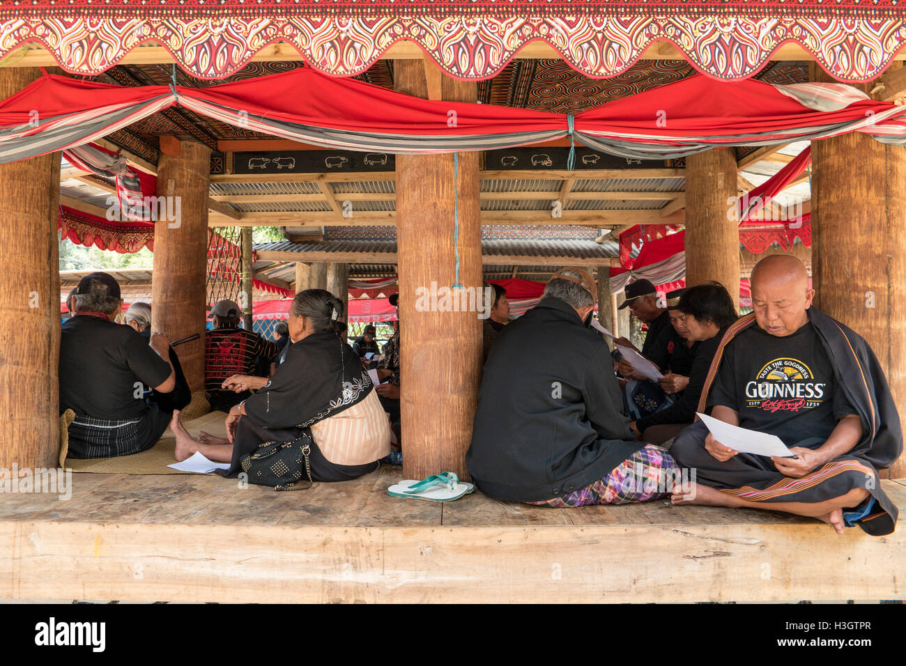 Family and relatives during the funeral day at the special hut in North Toraja, Indonesia. Stock Photo