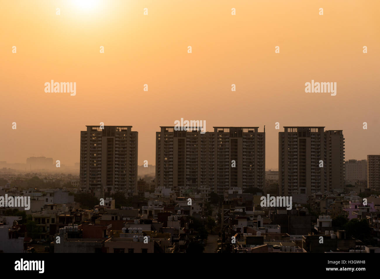 Dawn over gurgaon delhi showing the buildings in various stages of construction. The development of the city has led to a boom in infrastructure projects Stock Photo