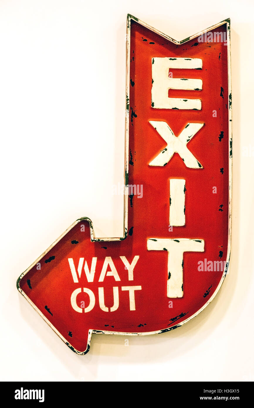 Exit sign. Red arrow sign on the white background. Stock Photo