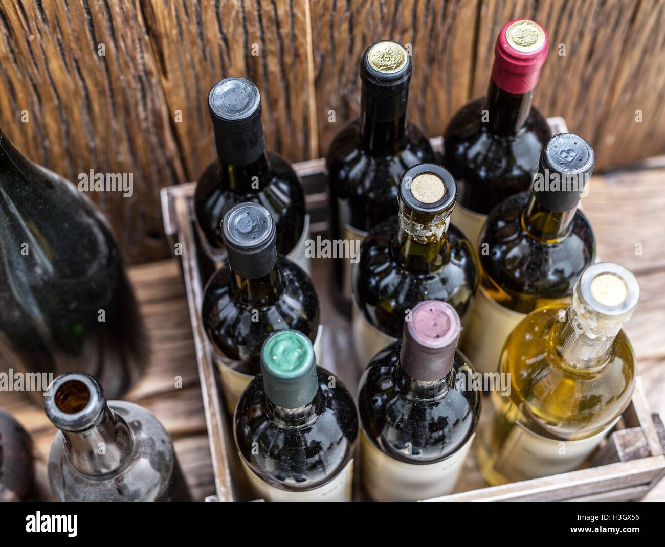 Old wine bottles in a wooden crate Stock Photo Alamy