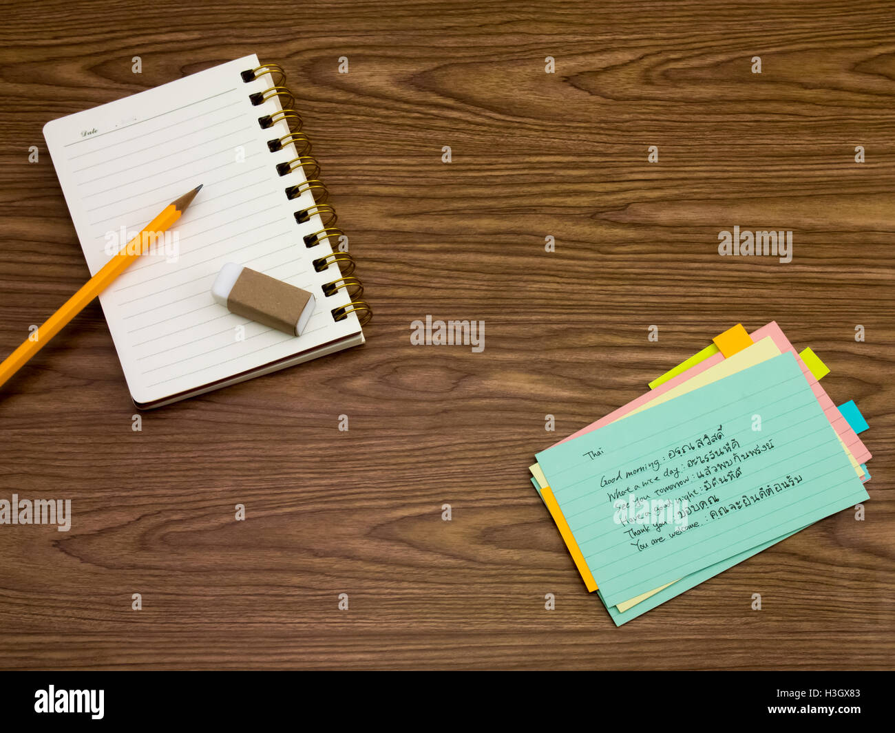 Thai; Learning New Language Writing Words on the Notebook Stock Photo