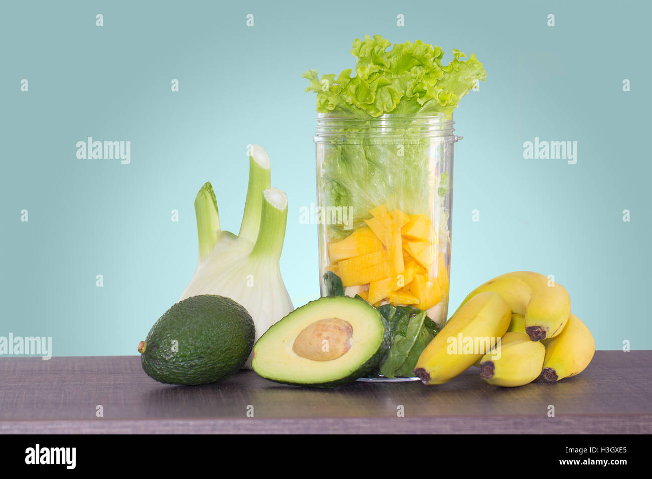 avocado and banana smoothie ingredients in blender Stock Photo