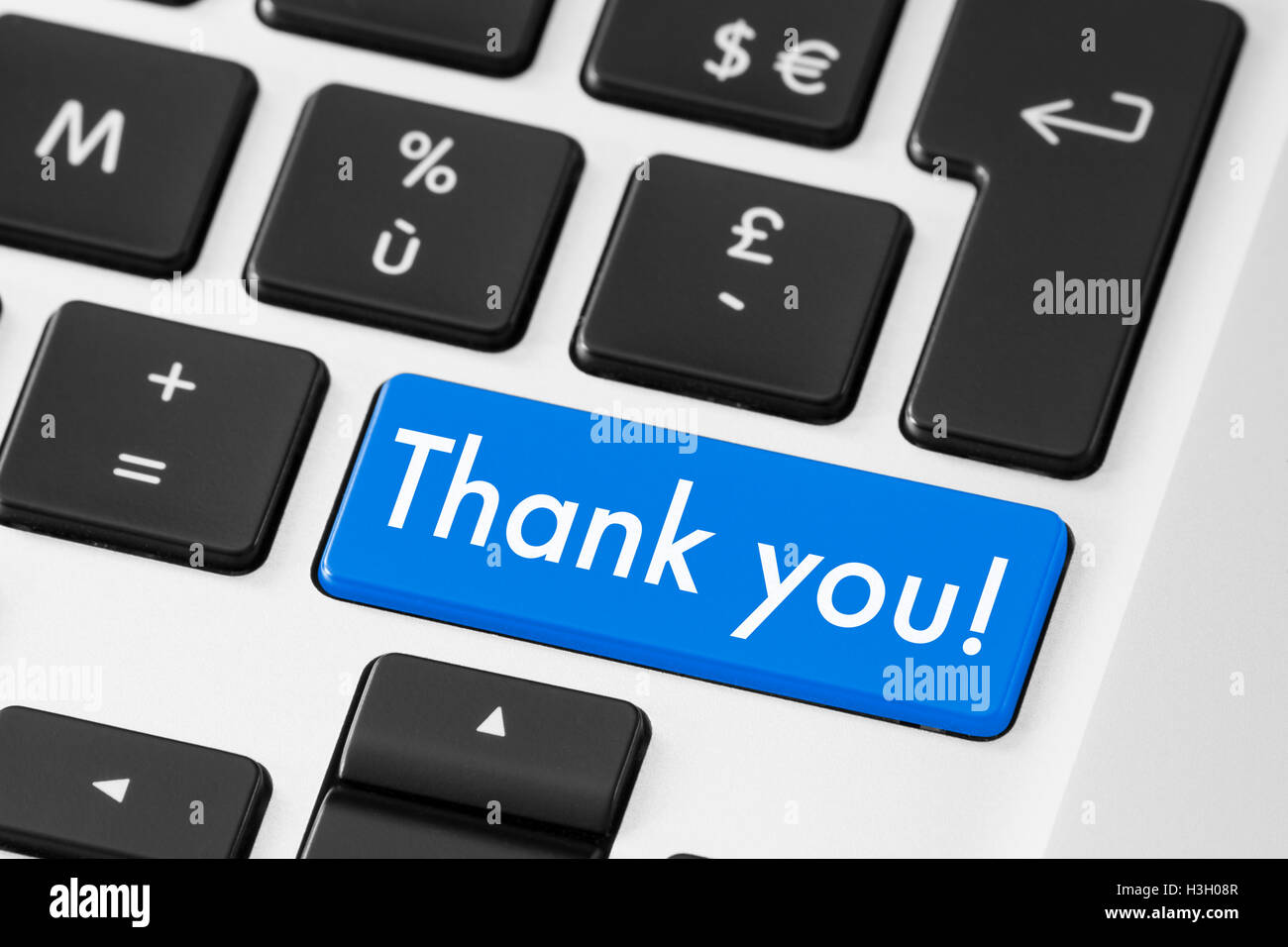 Thank you button keyboard for polite feedback Stock Photo
