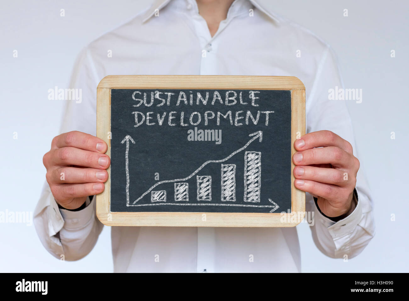 Successful sustainable development chart on chalkboard Stock Photo
