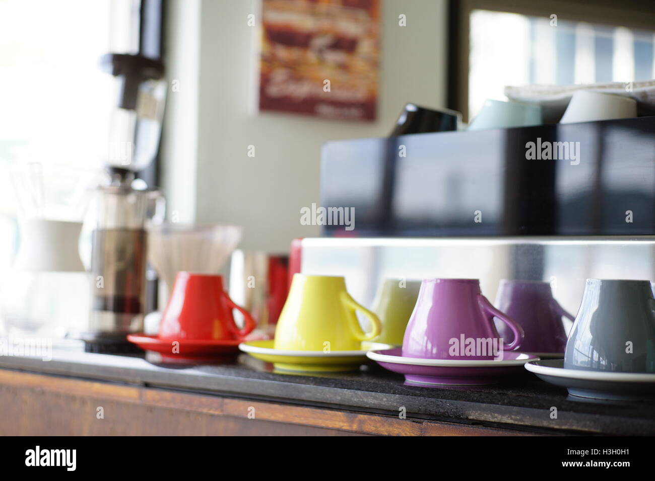 Colorful coffee cup in a coffee shop, selective focus Stock Photo