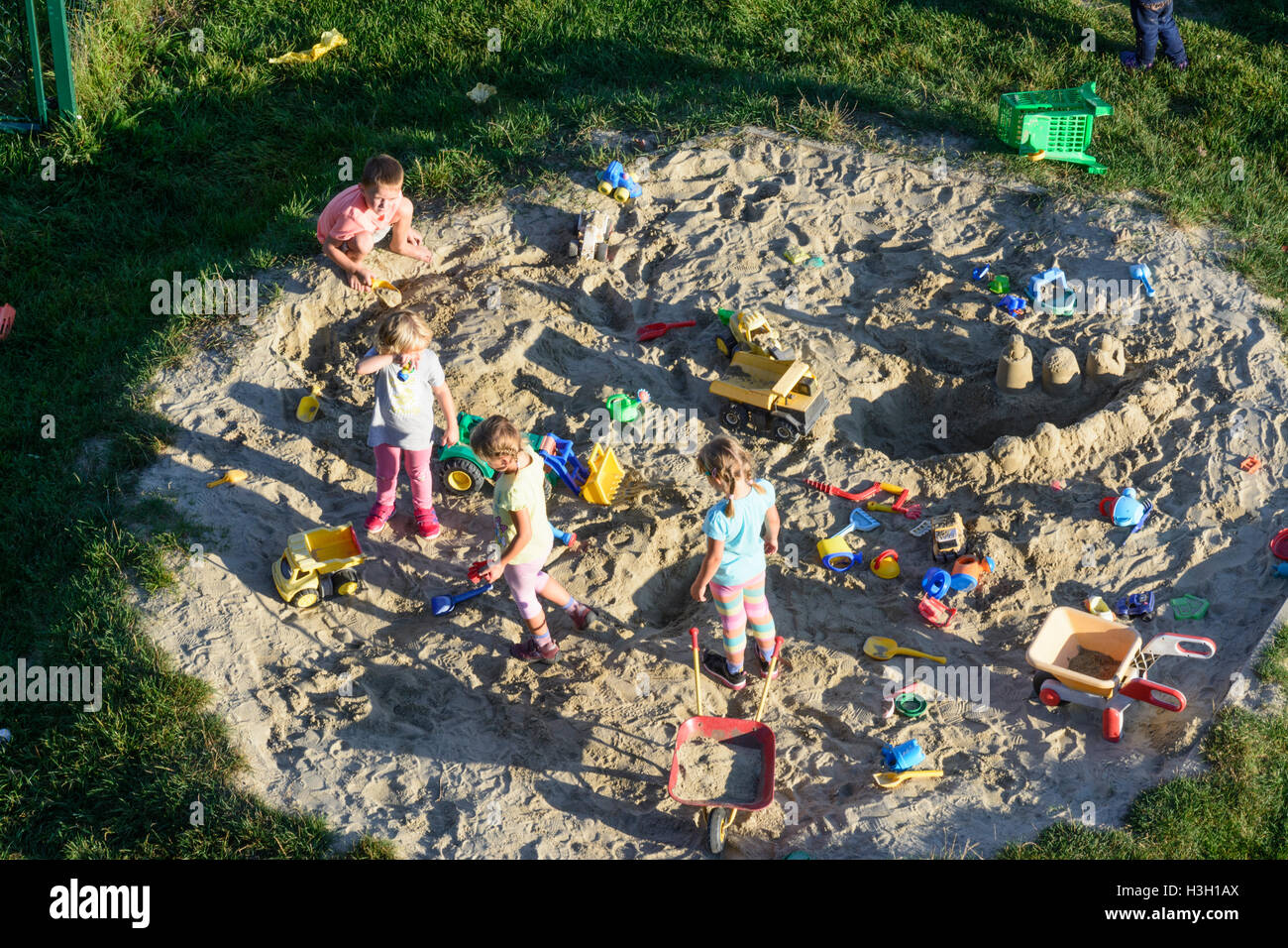 Neulengbach: kids at sandpit at playground, Wienerwald, Vienna Woods, Niederösterreich, Lower Austria, Austria Stock Photo