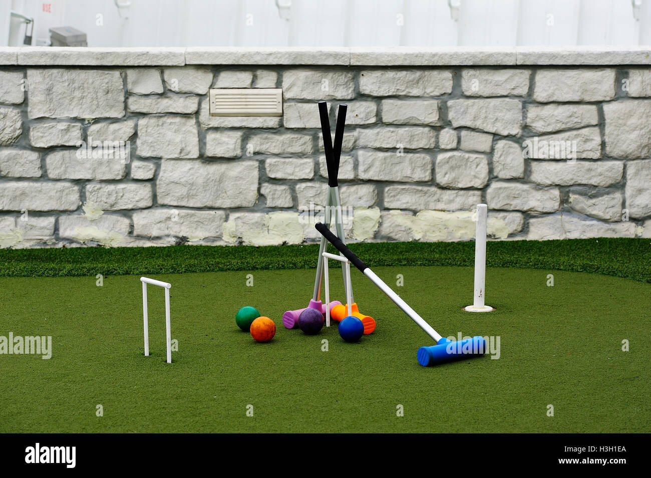 Croquet mallets and balls Stock Photo Alamy