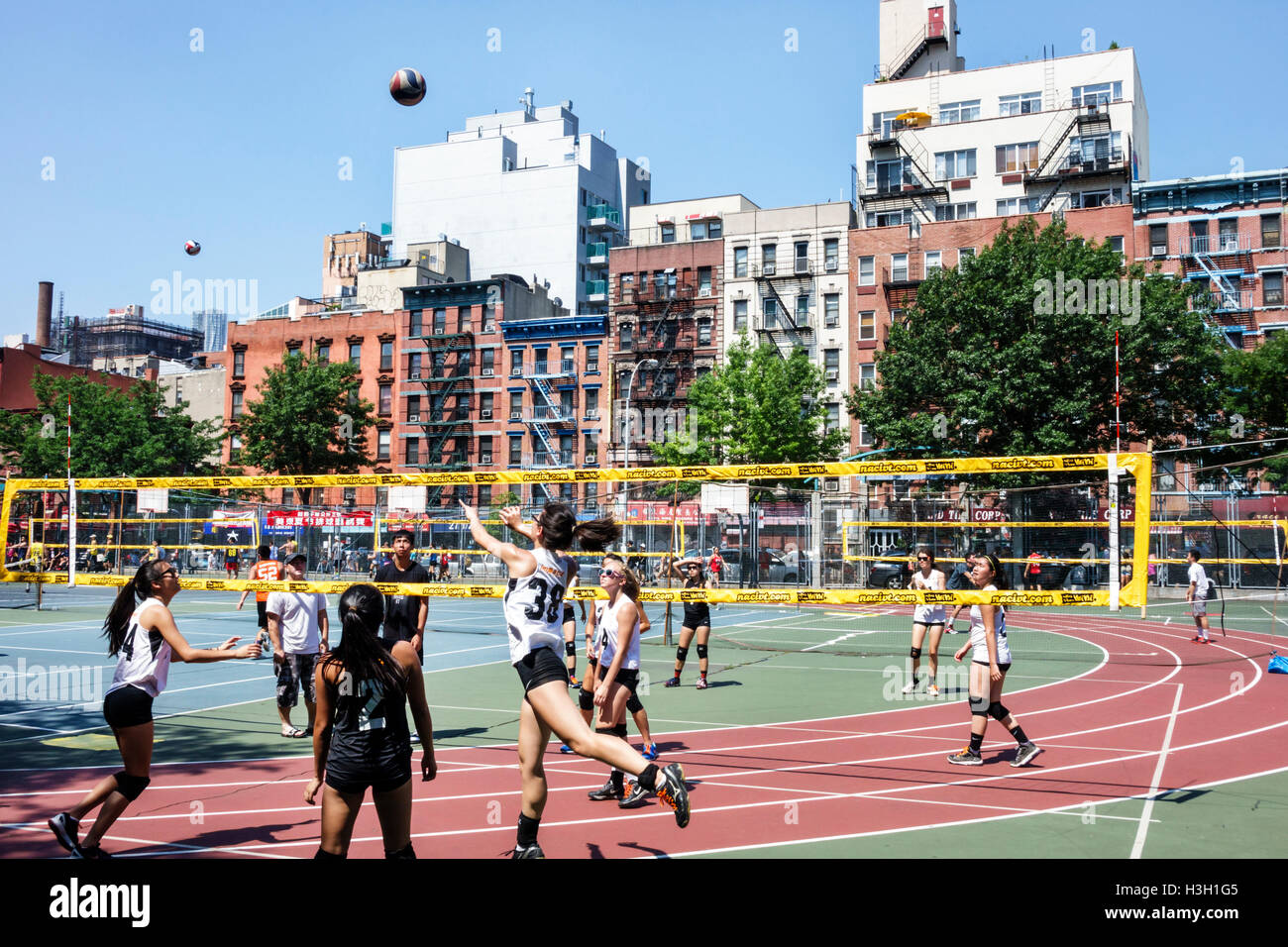 New York City,NY NYC Lower Manhattan,Chinatown,Seward Park,public park,athletic field,recreational sports,Mini Volleyball Tournament,volleyball,court, Stock Photo