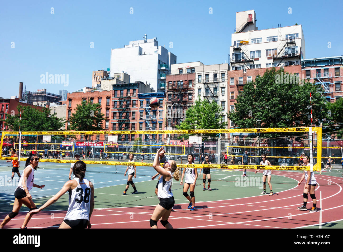 New York City,NY NYC,Lower Manhattan,Chinatown,Seward Park,public park,athletic field,recreational sports,Mini Volleyball Tournament,volleyball,court, Stock Photo