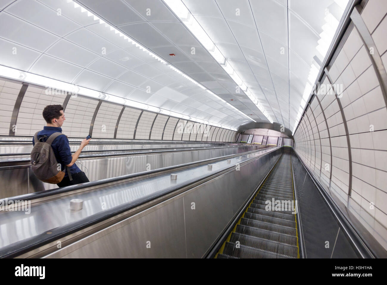 New York City,NY NYC,Manhattan,Chelsea,34th Street,Hudson Yards,subway,station,MTA,public transportation,escalator,adult,adults,man men male,descendin Stock Photo