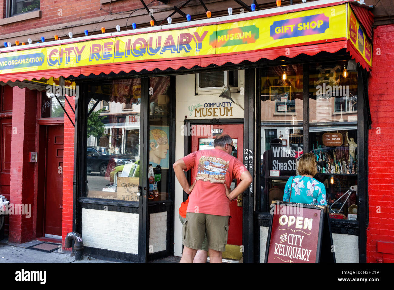New York City,NY NYC Brooklyn,Williamsburg,City Reliquary Museum,nonprofit heritage,artifacts,exterior,entrance,sign,adult,adults,man men male,woman f Stock Photo