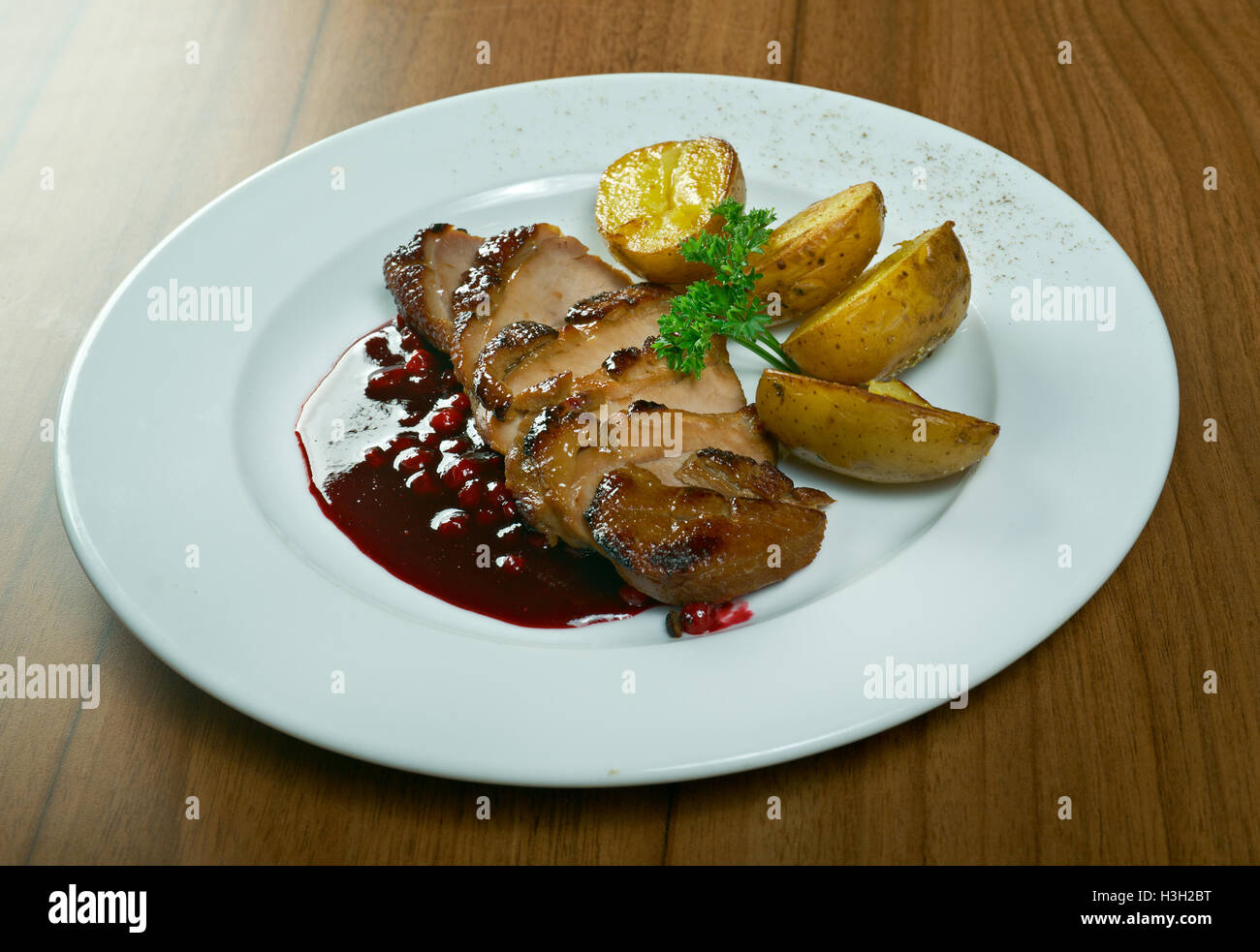 roast duck with potatoes.close up Stock Photo