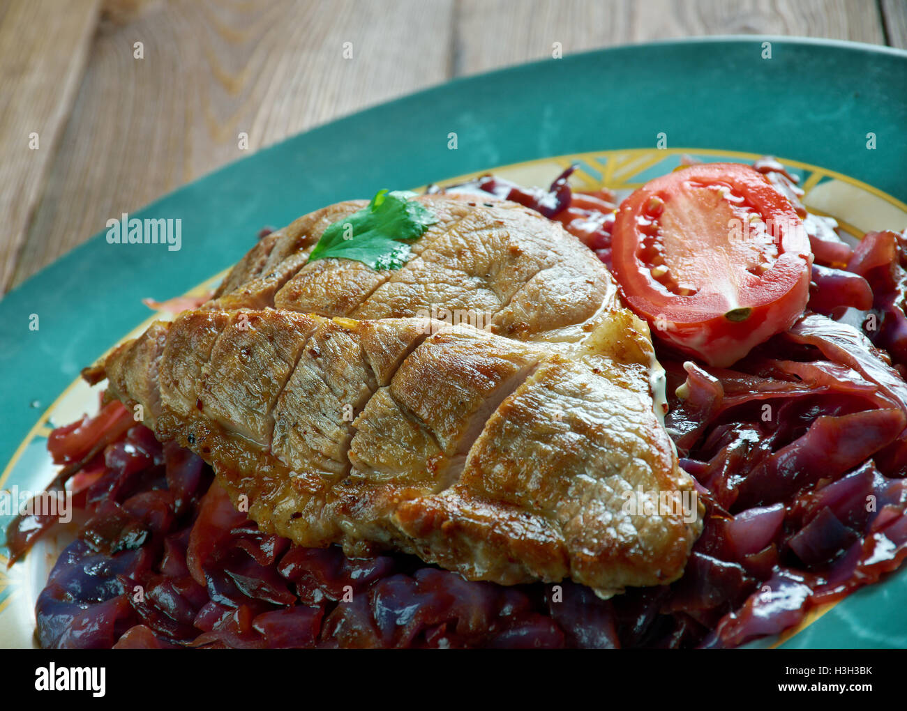 Pot Roast Of Pork And Red Cabbage Stock Photo