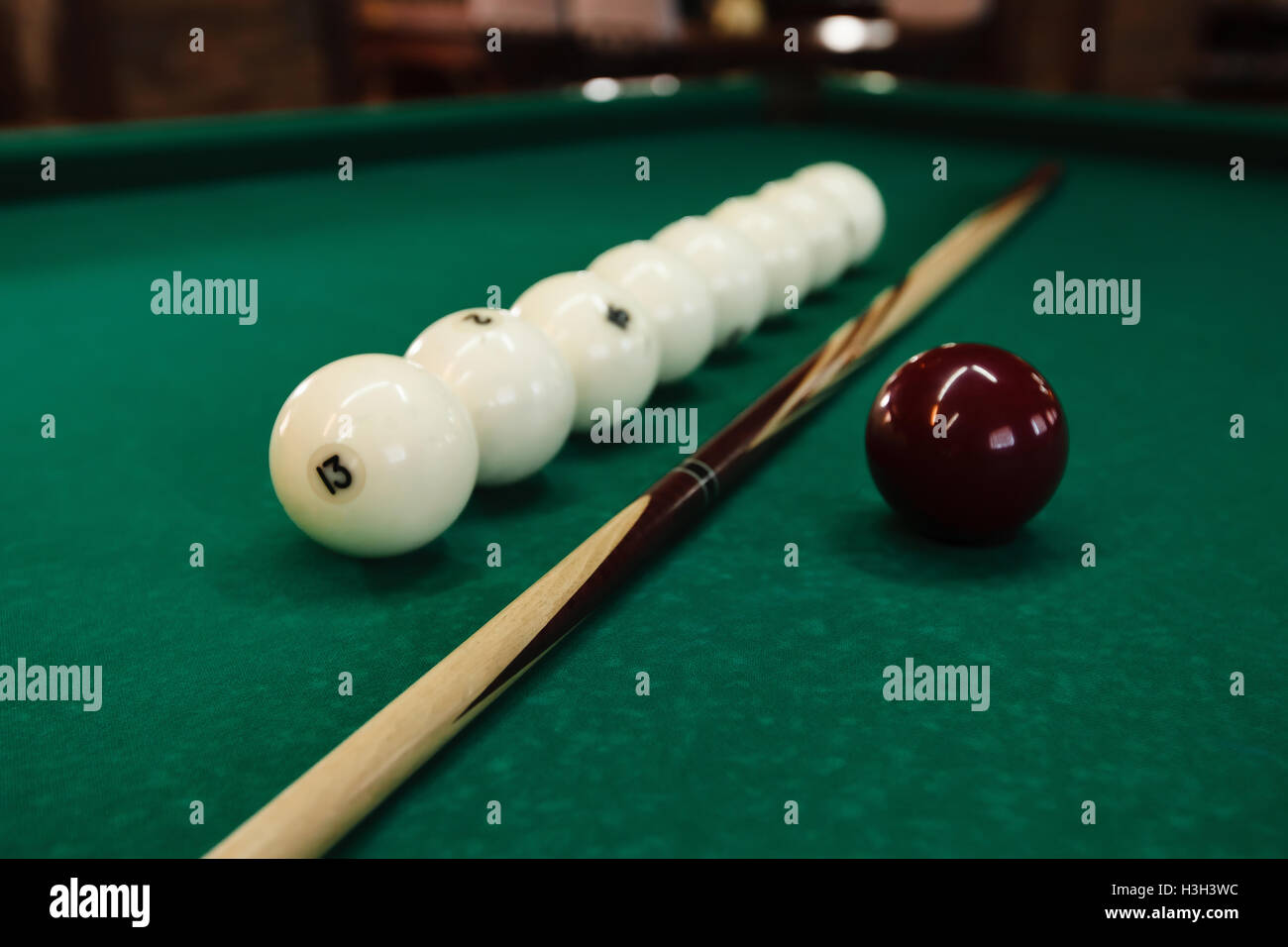 Billiard balls and pool sticks Stock Photo