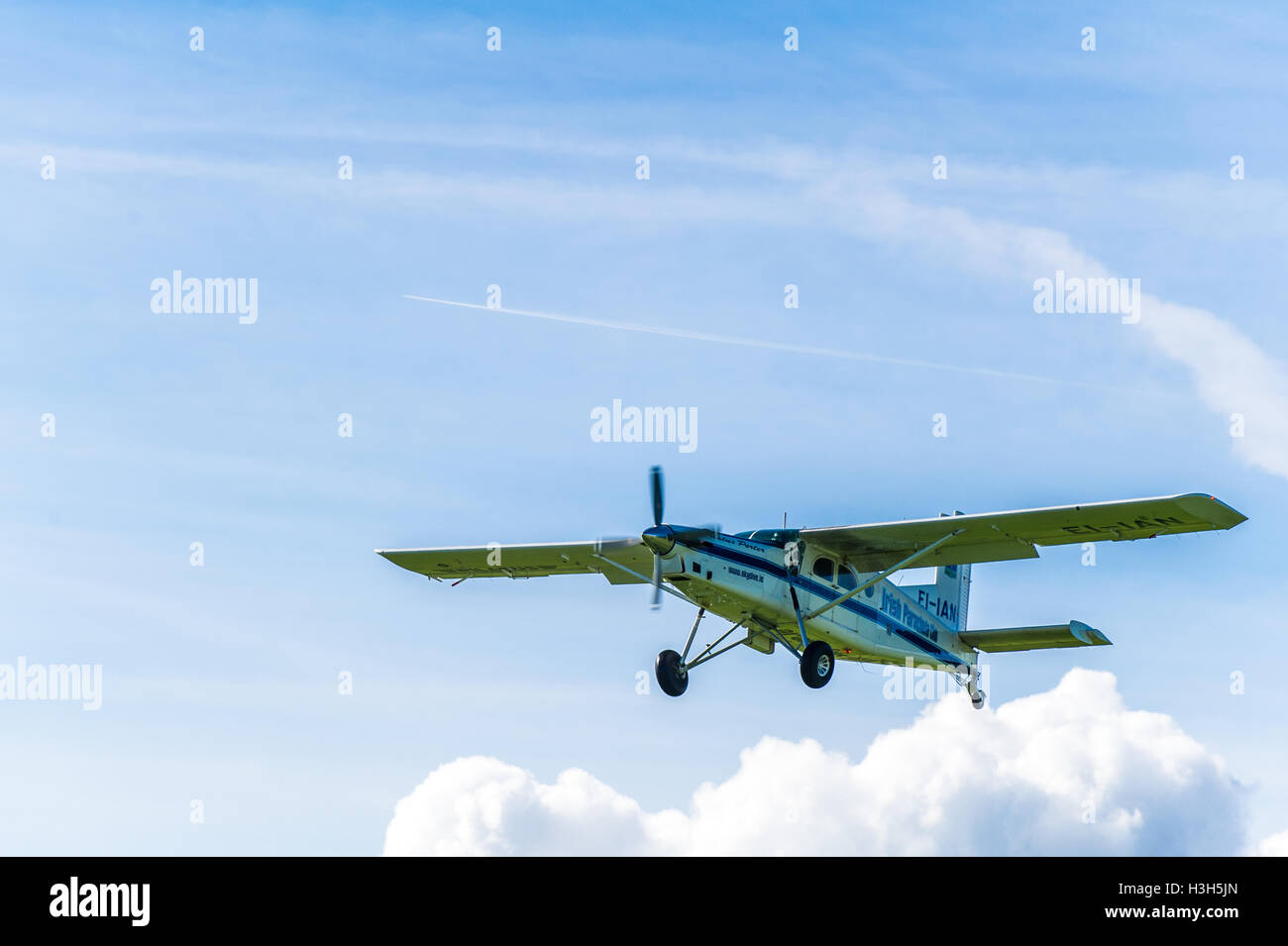 Irish Parachute Club's Pilatus PC-6 Porter takes off full of skydivers in County Offaly, Ireland with copy space. Stock Photo