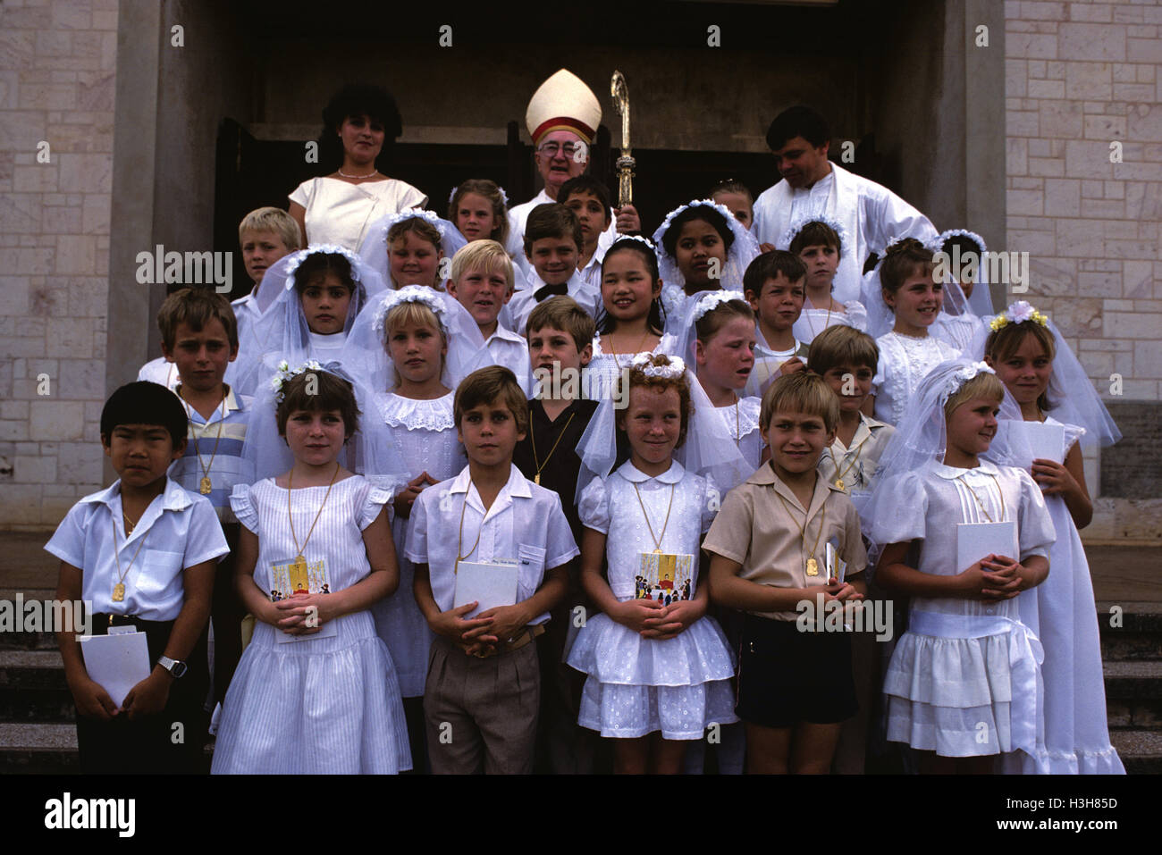 Children on the day of their first communion, Stock Photo