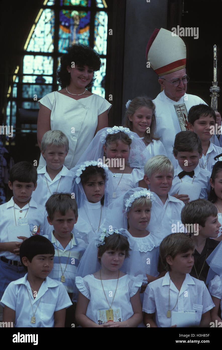 Children at First Communion. Stock Photo