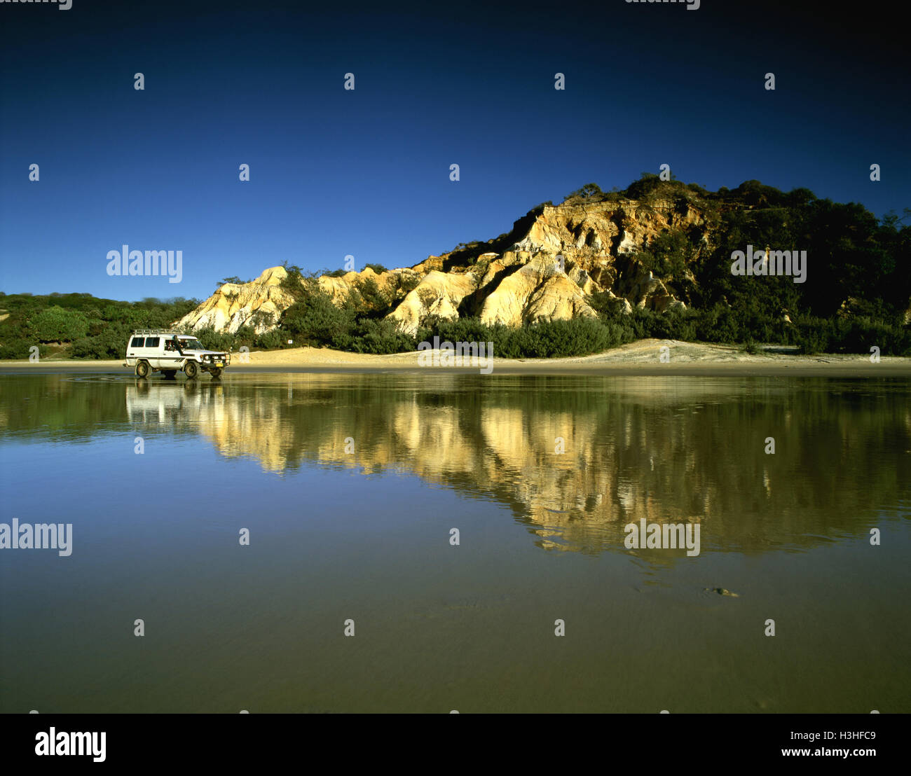 The Pinnacles with 4WD vehicle and reflection. Stock Photo