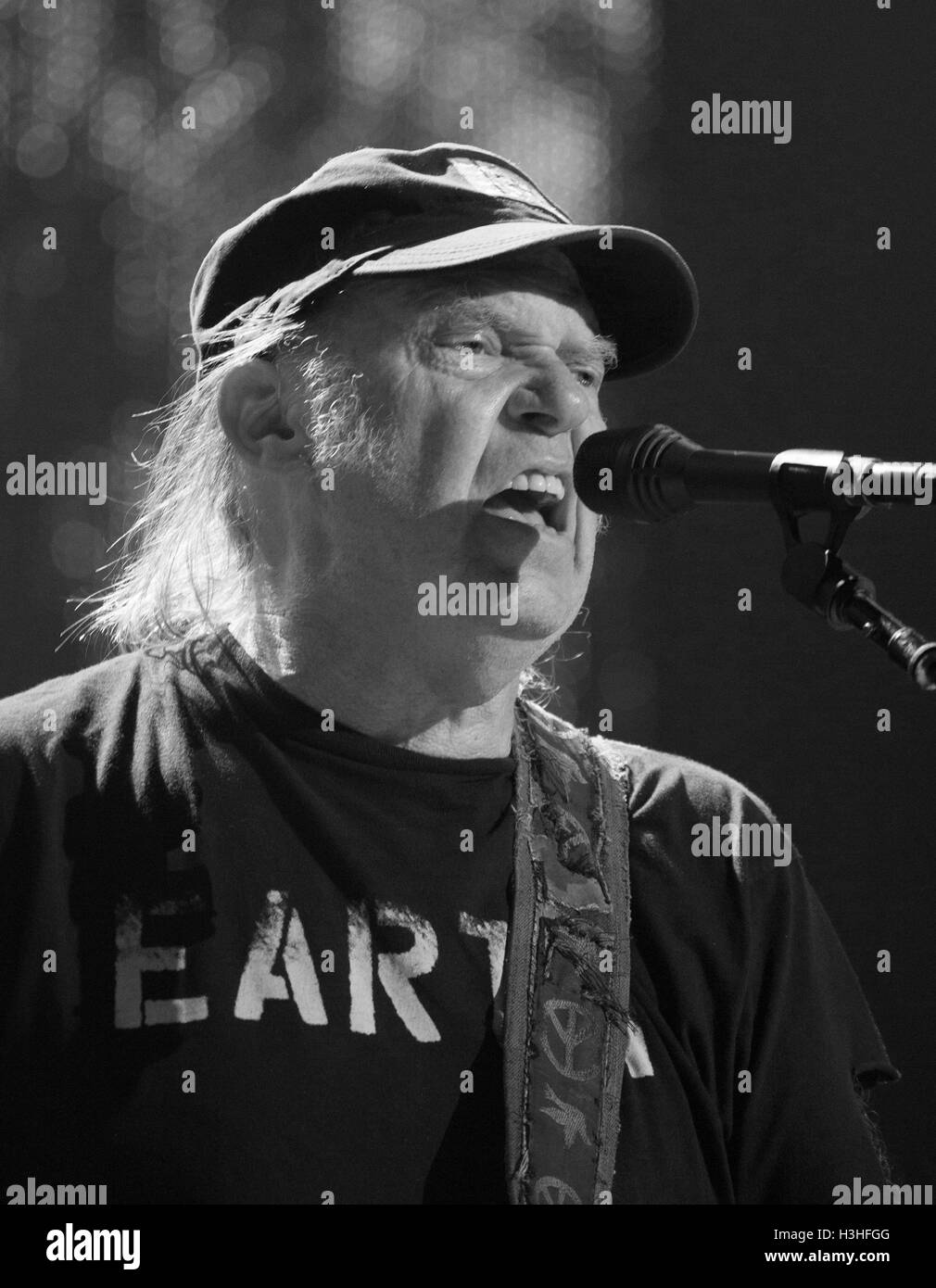 Neil Young performs during the 2016 Farm Aid at Jiffy Lube Live on September 17, 2016 in Bristow, VA. Stock Photo