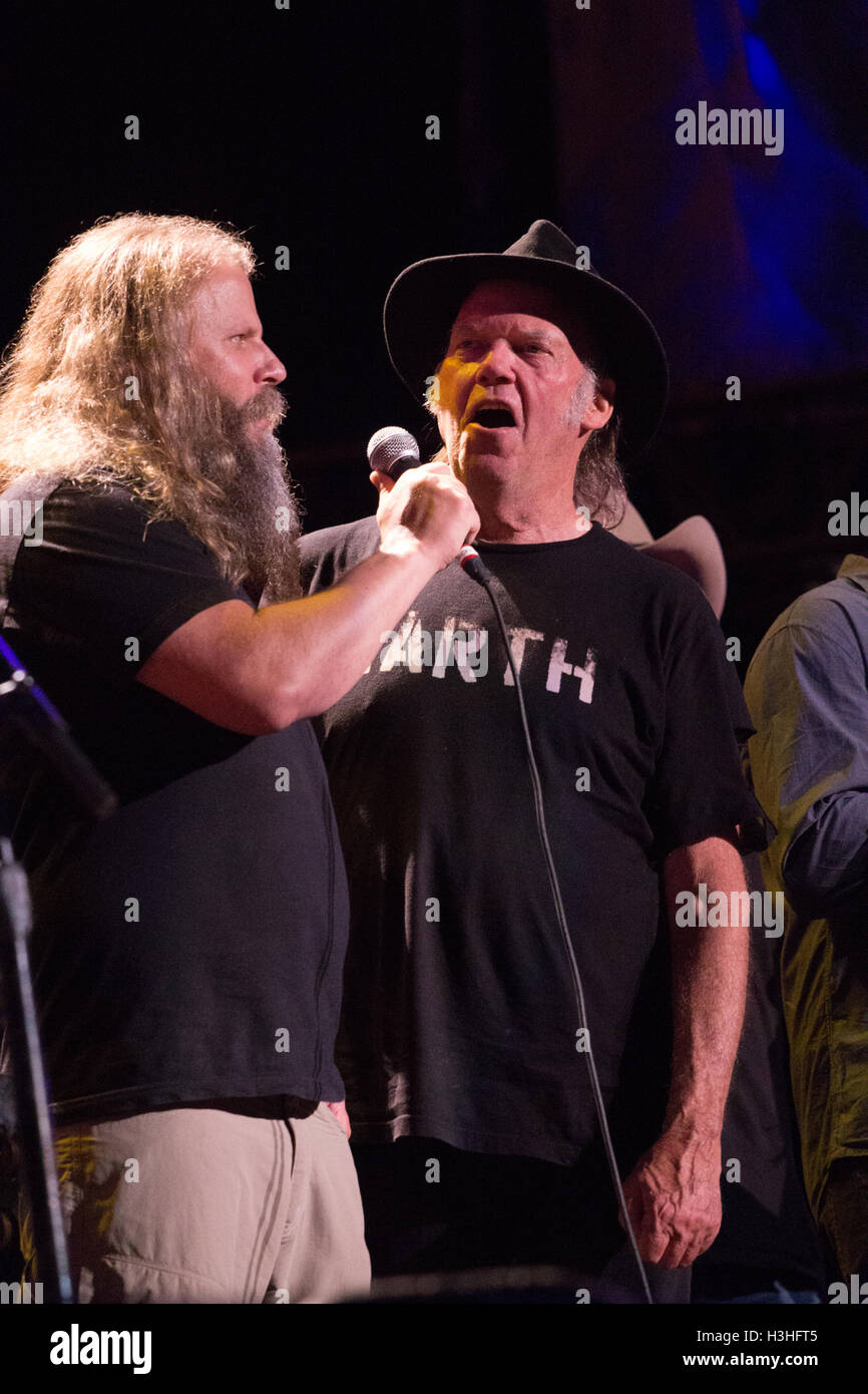 Neil Young (L) and Jamey Johnson on stage during the finale at the 2016 Farm Aid at the Jeffy Lube Live in Bristow, VA September 17, 2016 Stock Photo