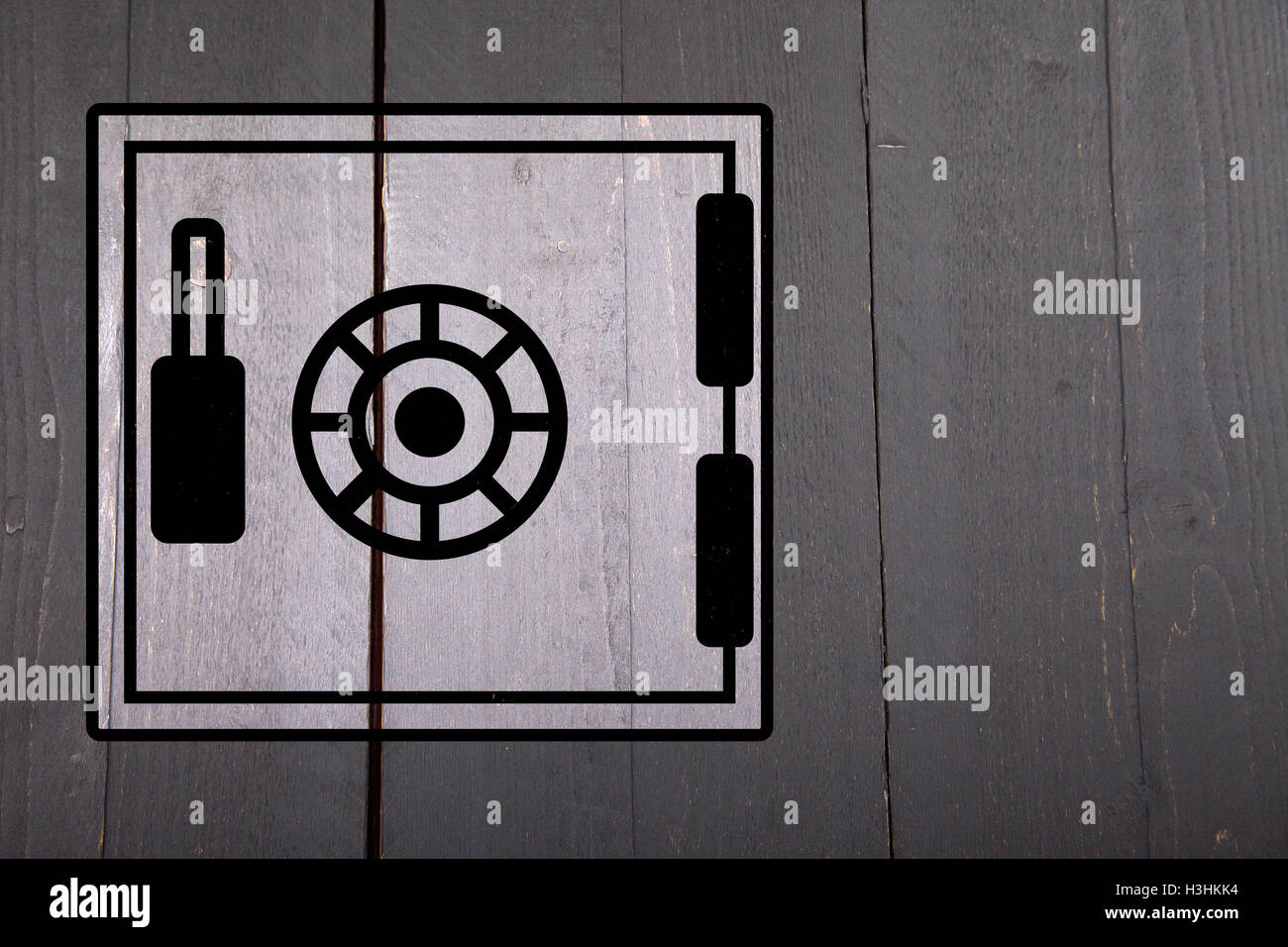 Illustration of a safe on black wooden background Stock Photo