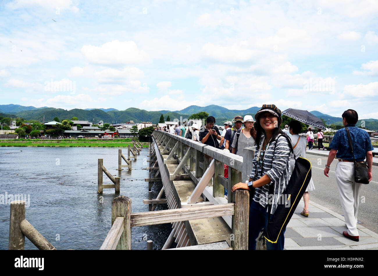 Thai woman and Japanese people and traveler foreigner posing for ...