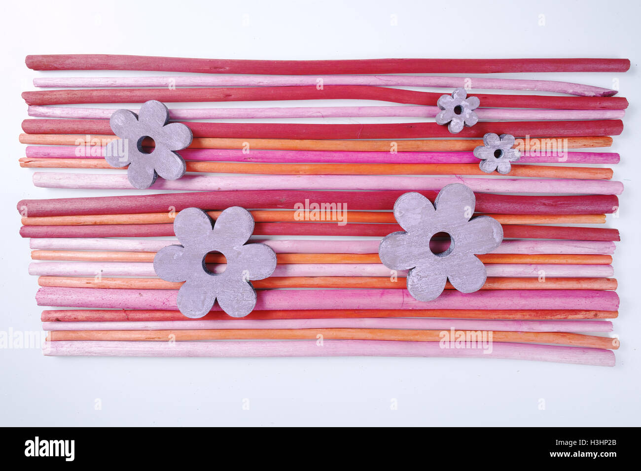 Decorative colorful wooden sticks on white background Stock Photo