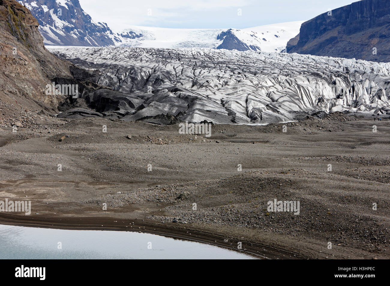 ash covered Skaftafell glacier kettle hole and end moraine Vatnajokull