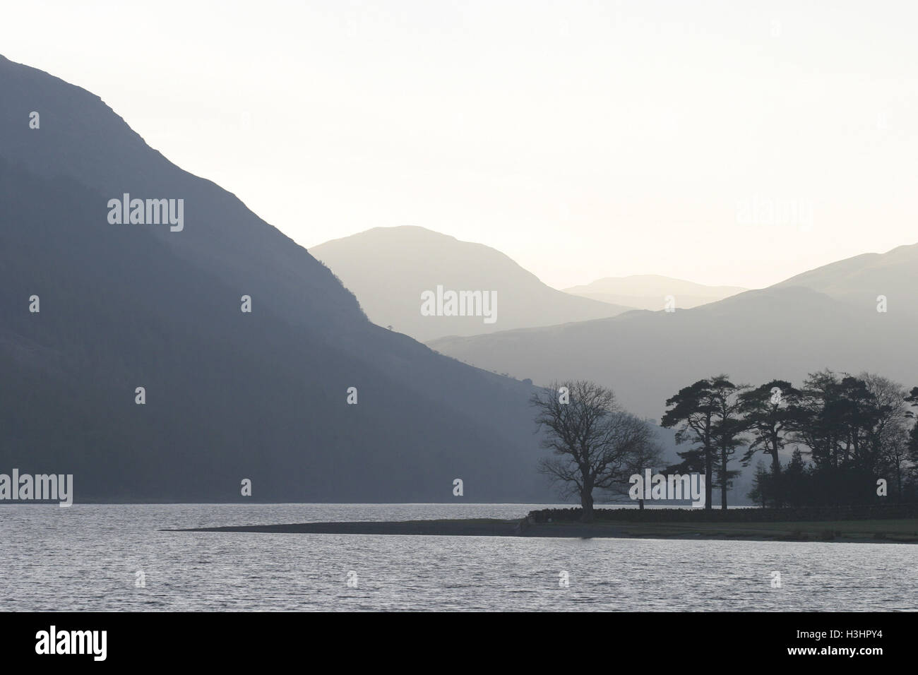 English Lake District. Buttermere ('mere' means lake) at dusk with Red Pike, one of the 'Buttermere Trio' rising to the left. Stock Photo