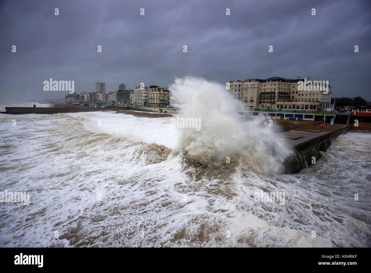 Waves crashing onto the beach during a winter storm Stock Photo