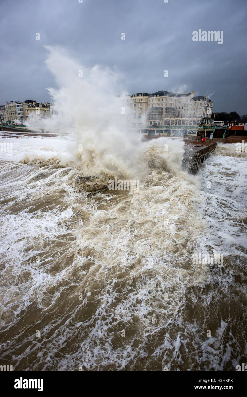 Waves crashing onto the beach during a winter storm Stock Photo