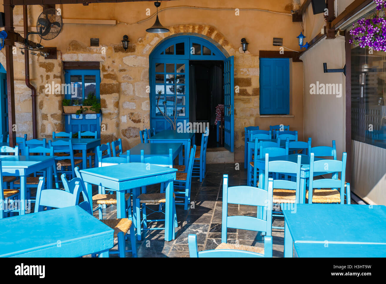 Empty greek cafe on Crete Island, Greece Stock Photo - Alamy