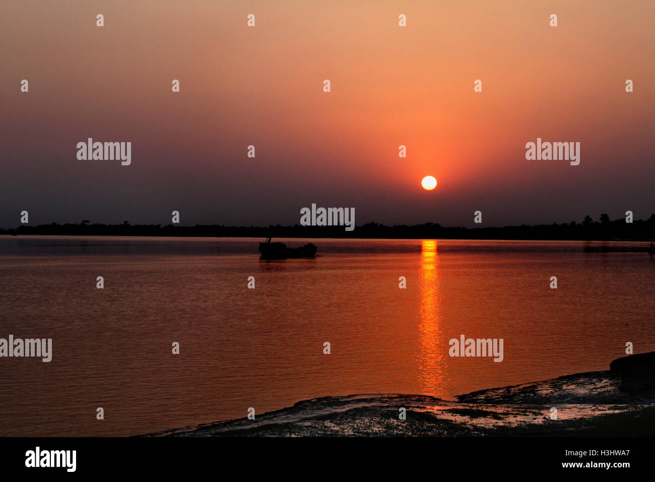 Sunset on the Shipsha River,Khulna Bangladesh. Stock Photo