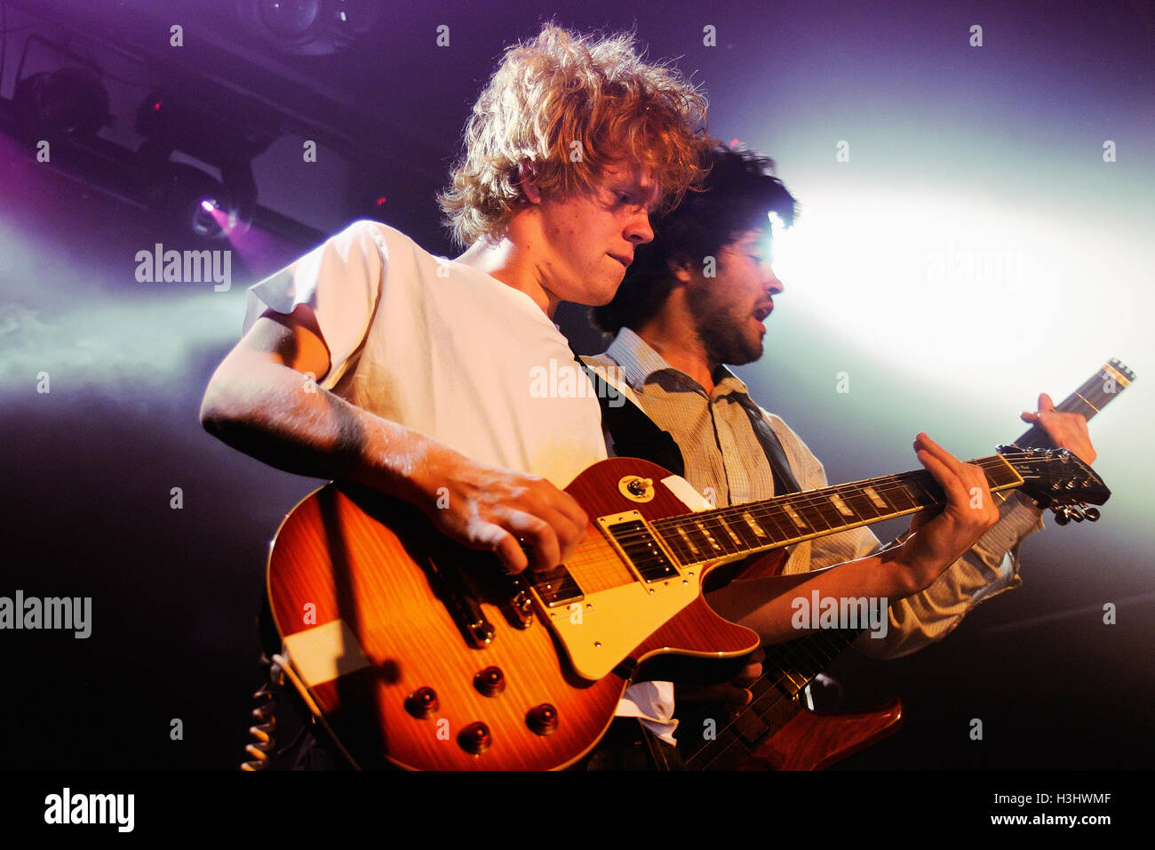 BARCELONA - OCT 27: Guitarist of Kakkmaddafakka (Norwegian indie rock band) performs at Music City Hall. Stock Photo