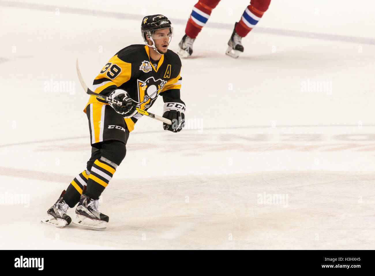 Game action between the Montreal Canadiens and the Pittsburgh Penguins