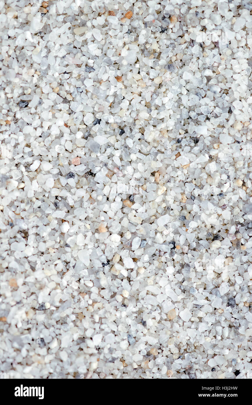Quartz sand abstract texture as background, macro view of grainy surface Stock Photo