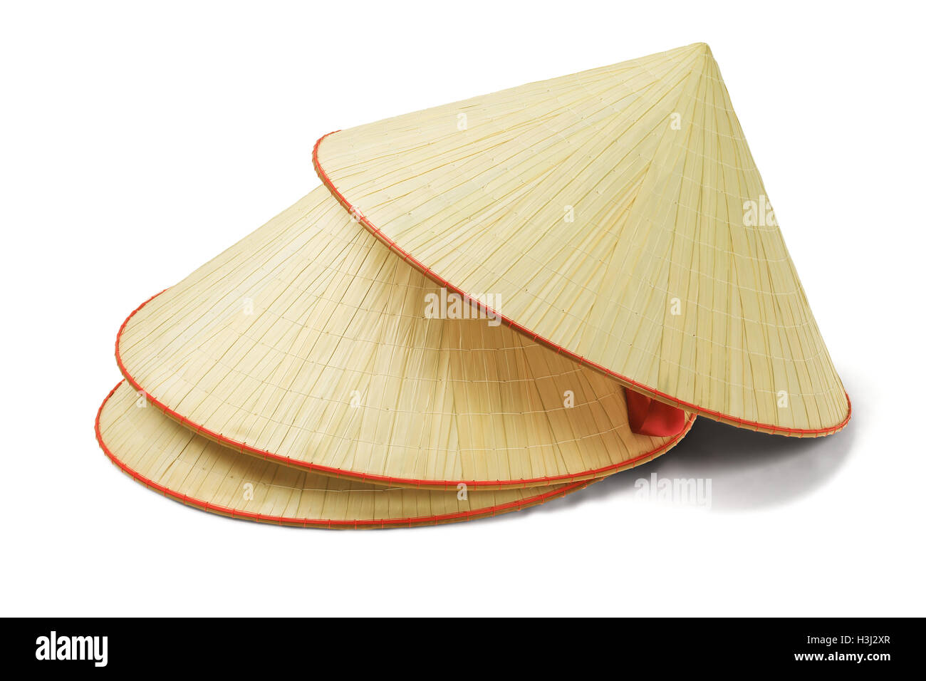 Stack of Oriental Straw Hats on White Background Stock Photo Alamy