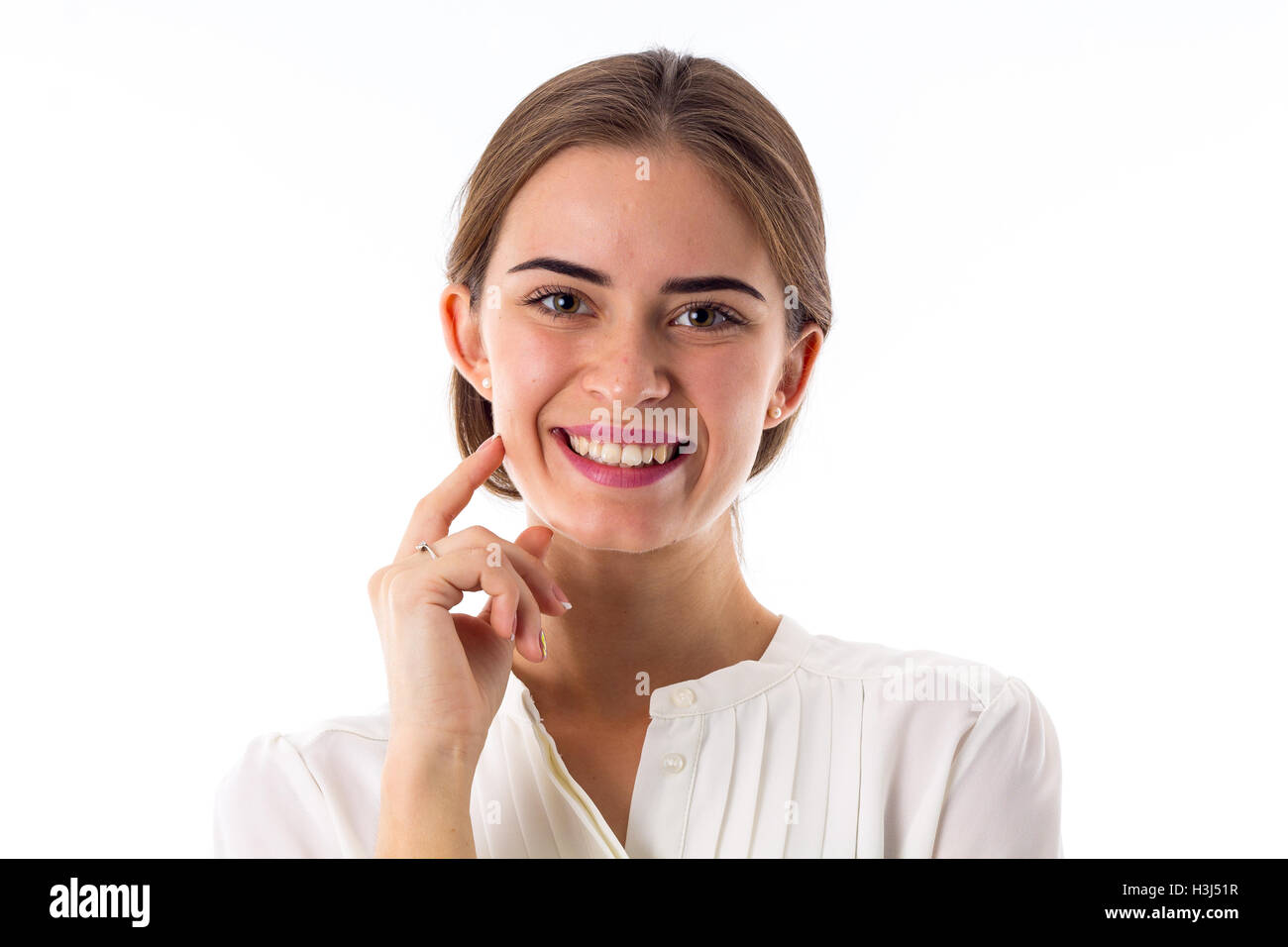 Smiling woman holding hand near the face Stock Photo