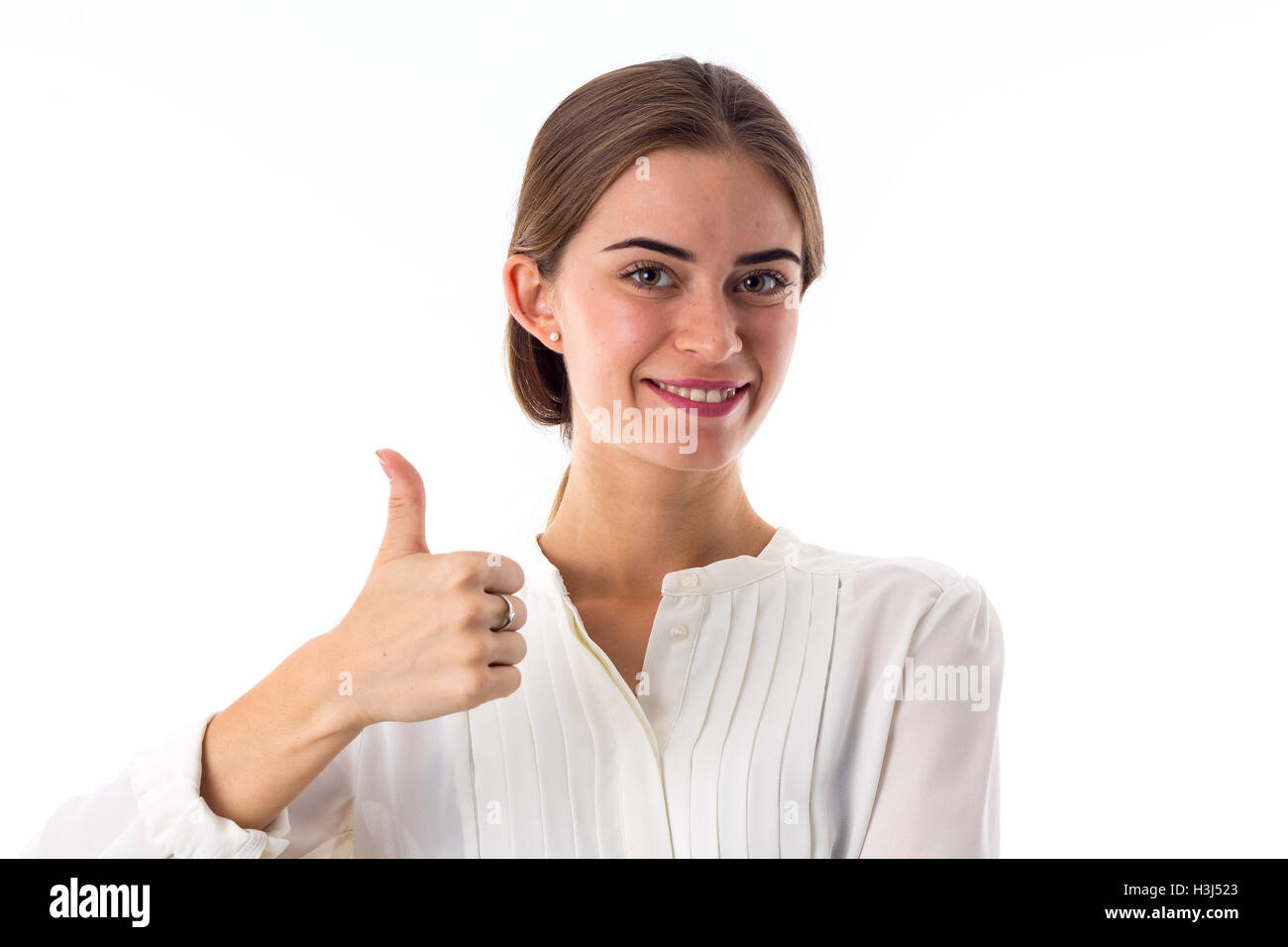 Woman showing thumb up Stock Photo - Alamy