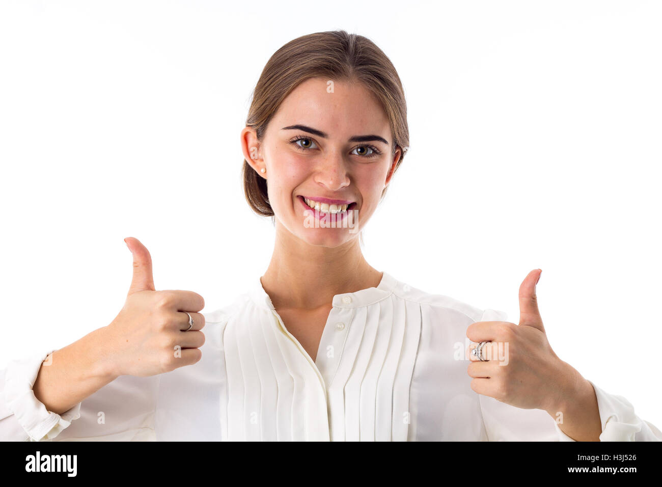 Woman showing thumbs up Stock Photo - Alamy