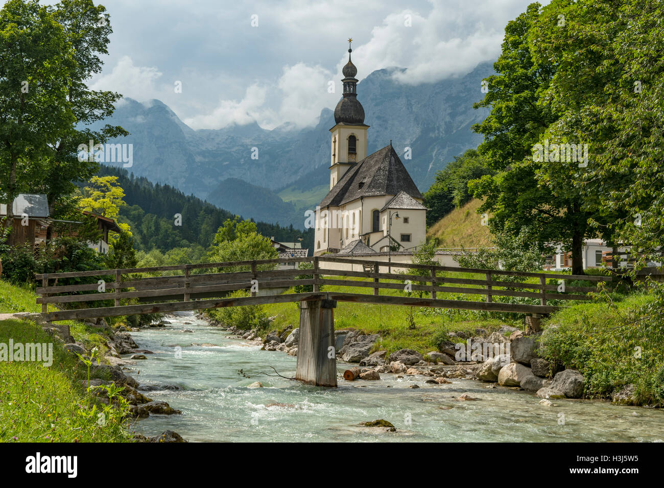 St Sebastians Kirche and River Tal, Ramsau, near Berchtesgaden, Germany Stock Photo