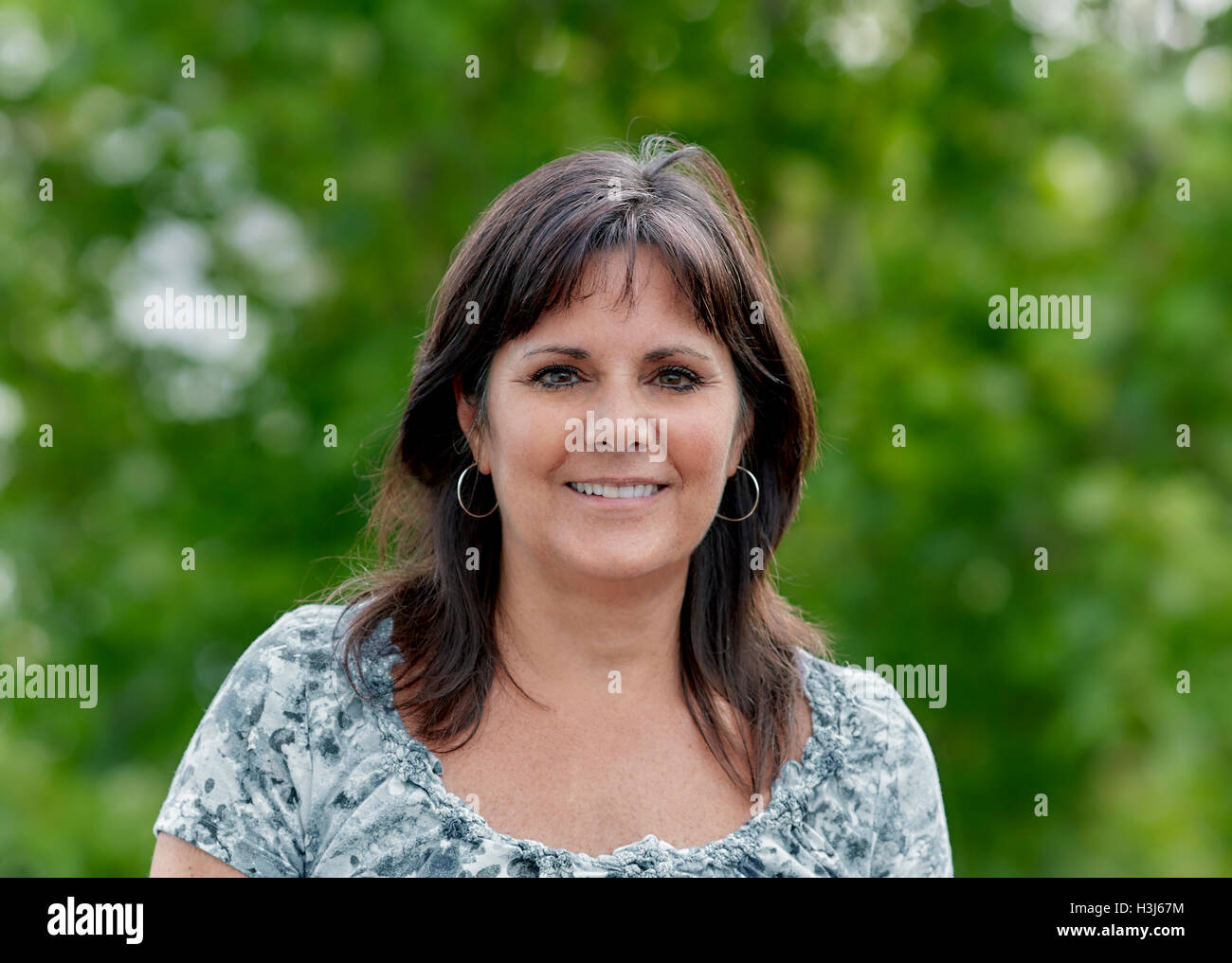 Mature brunette woman hi-res stock photography and images - Alamy