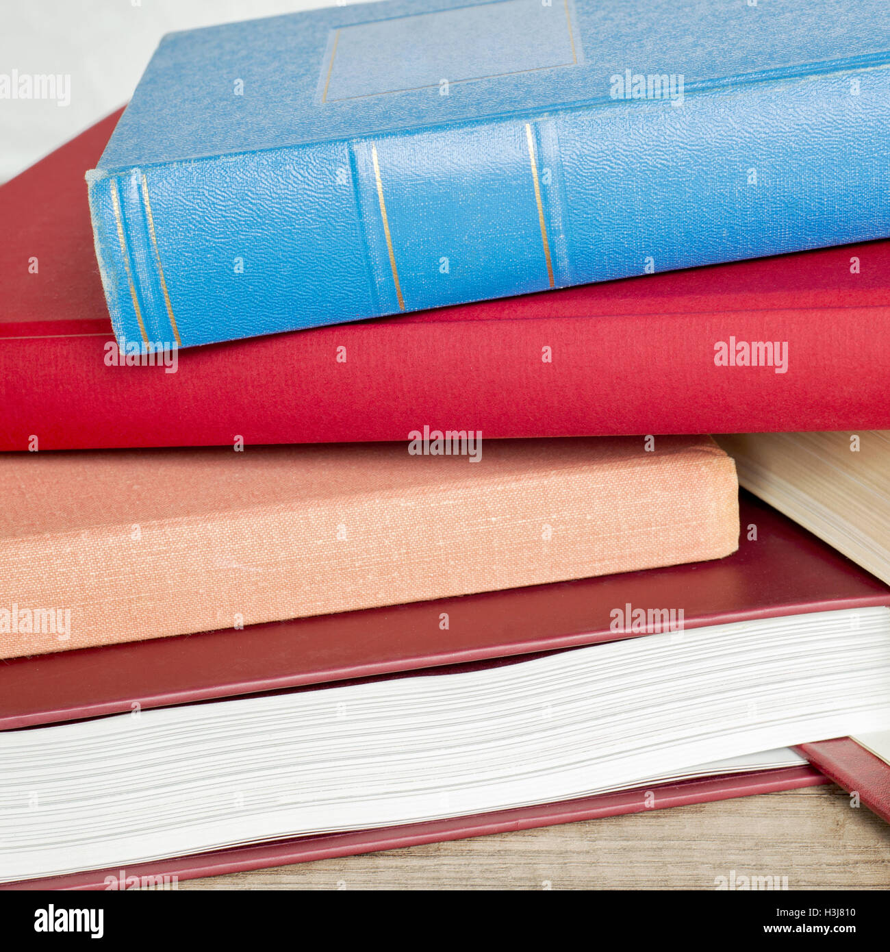 stack of books on the floor Stock Photo